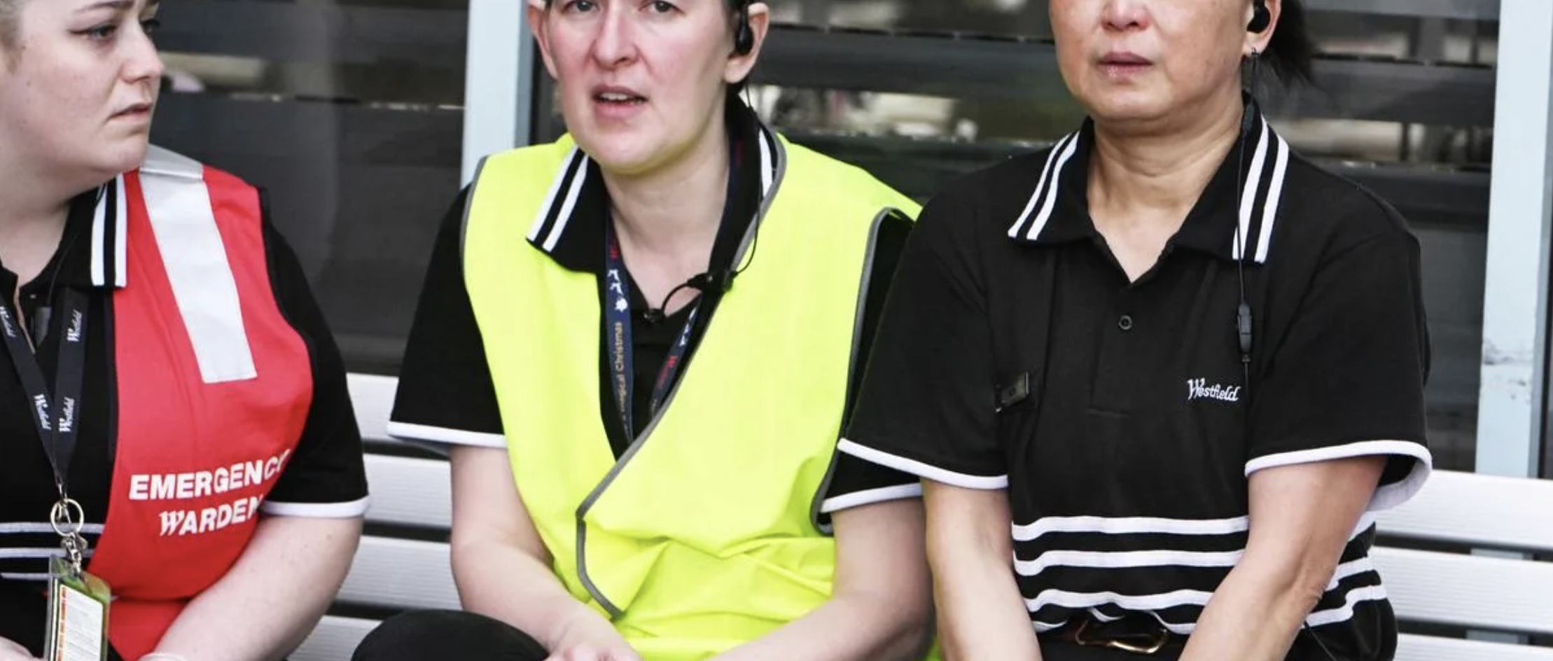 Shopping centre staff in warden vests during an emergency exercise